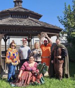 A group of SJ Games folks standing by the gazebo