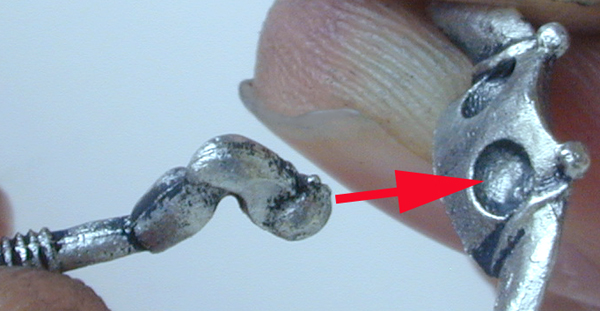 The ball
of the fore leg, being inserted into the socket on the underside of
the chest plate.