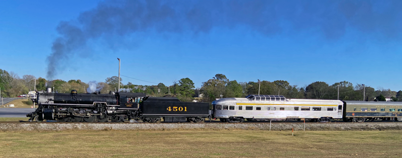 Railcar 1877 behind engine 4501
